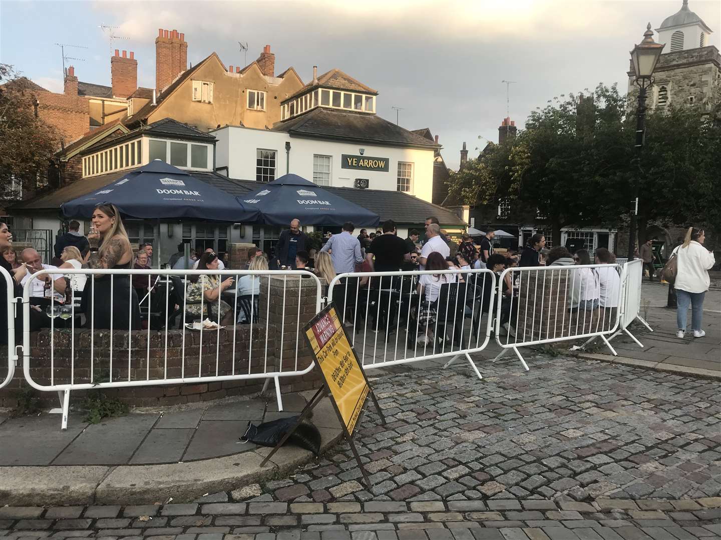 The Ye Arrow and Jolly Knight garden is a popular watering hole before the gig