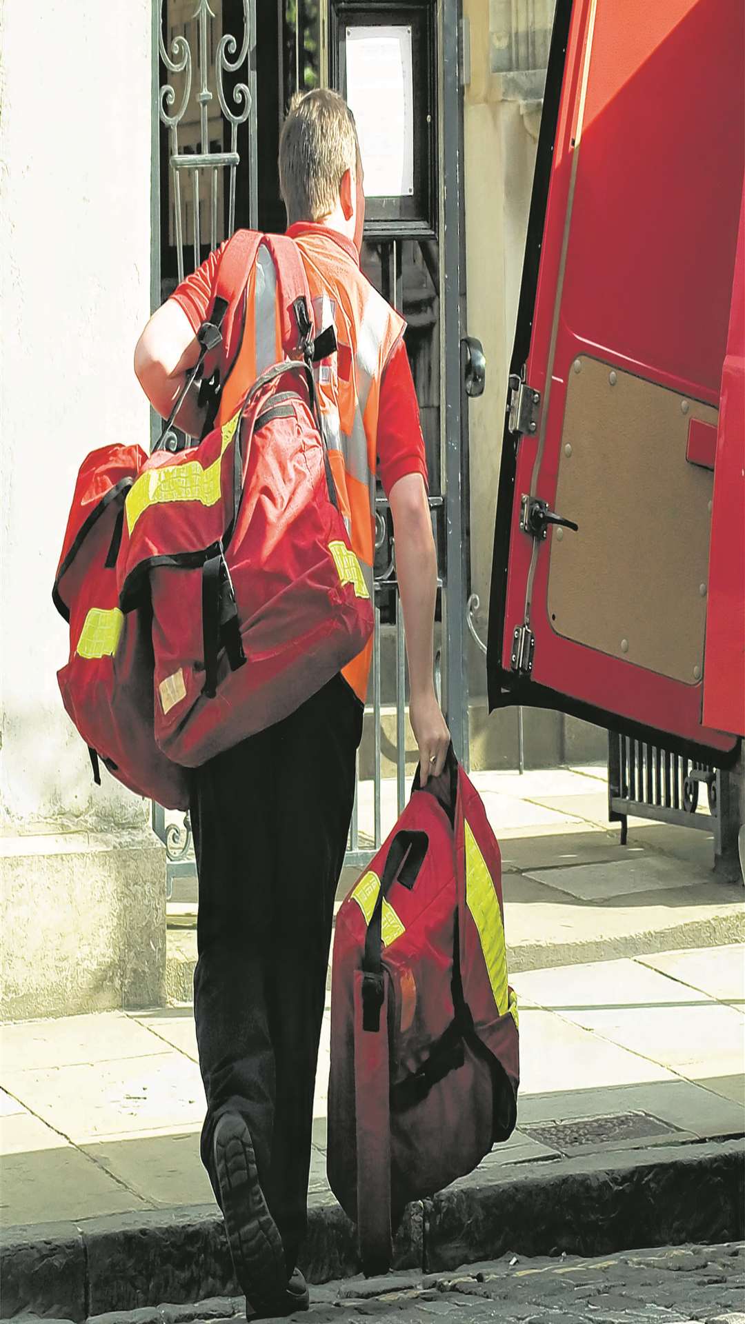 Stock image of a postman