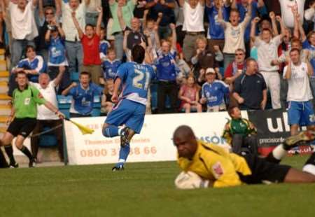 Matt Jarvis wheels away after scoring the Gills' second goal. Picture: BARRY GOODWIN