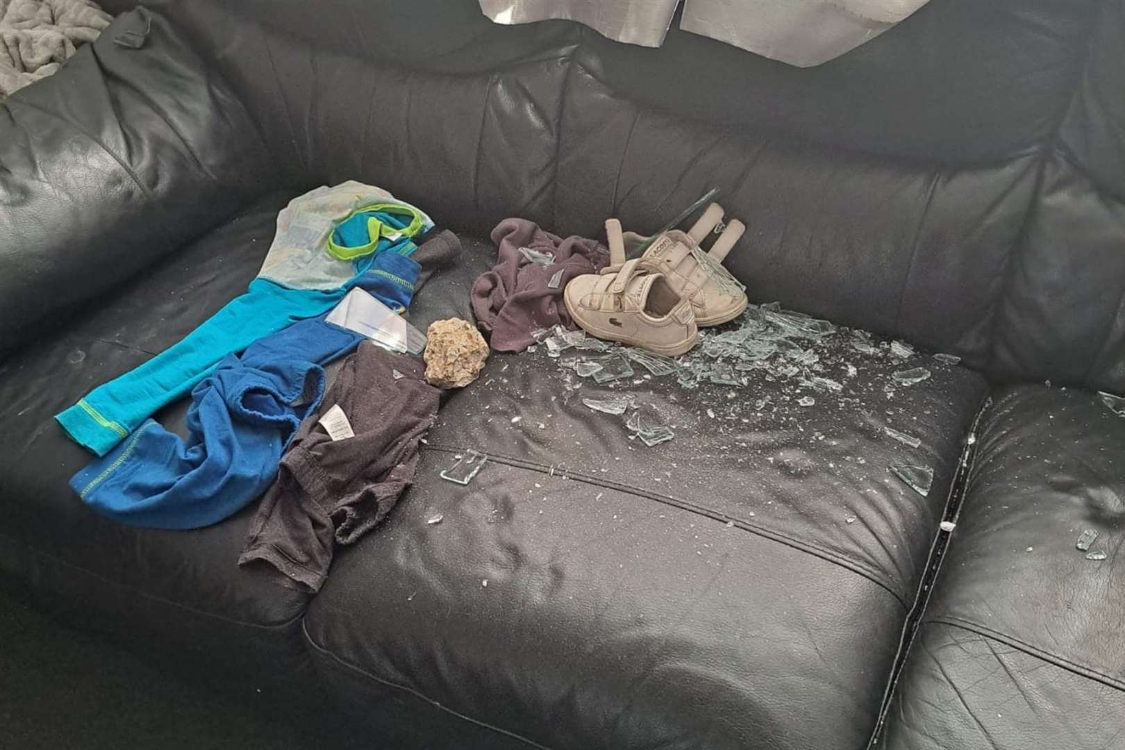 Glass was strewn over Mrs Horton's son's clothing. Photo: Rebecca Horton