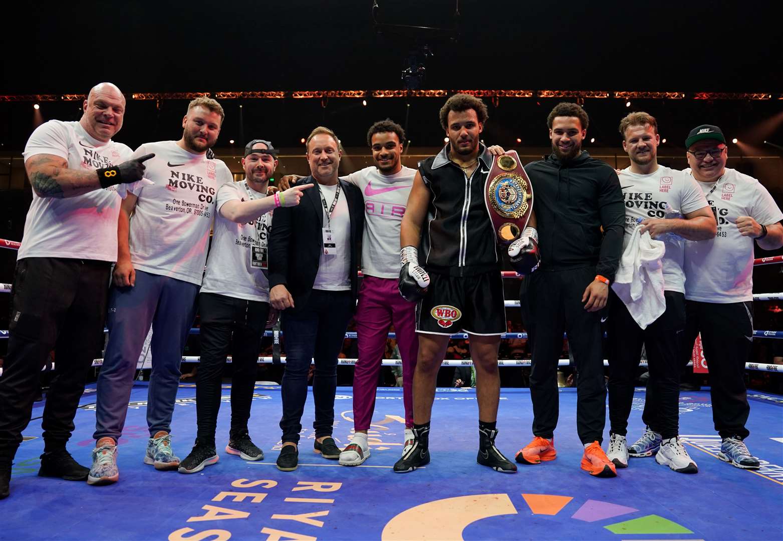 Moses Itauma and his current team with the Inter-Continental Heavyweight title belt Picture: Queensberry