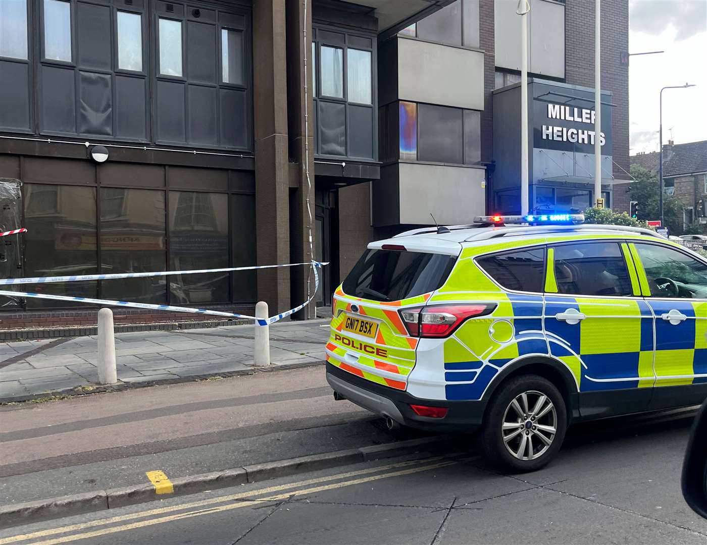 A man was allegedly attacked outside the block of flats