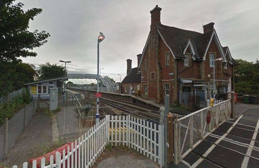 The men were escorted off at Wye Train Station. Picture: Google