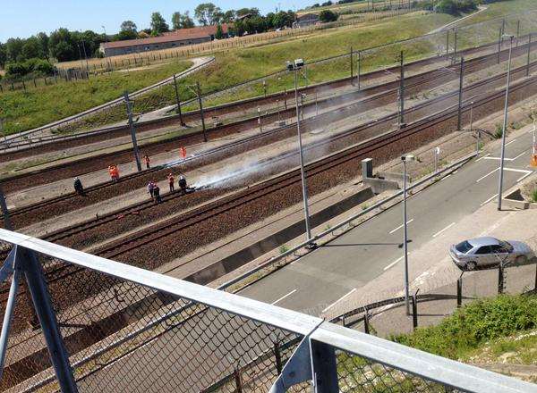 Protesters start a fire at the Eurotunnel French terminal