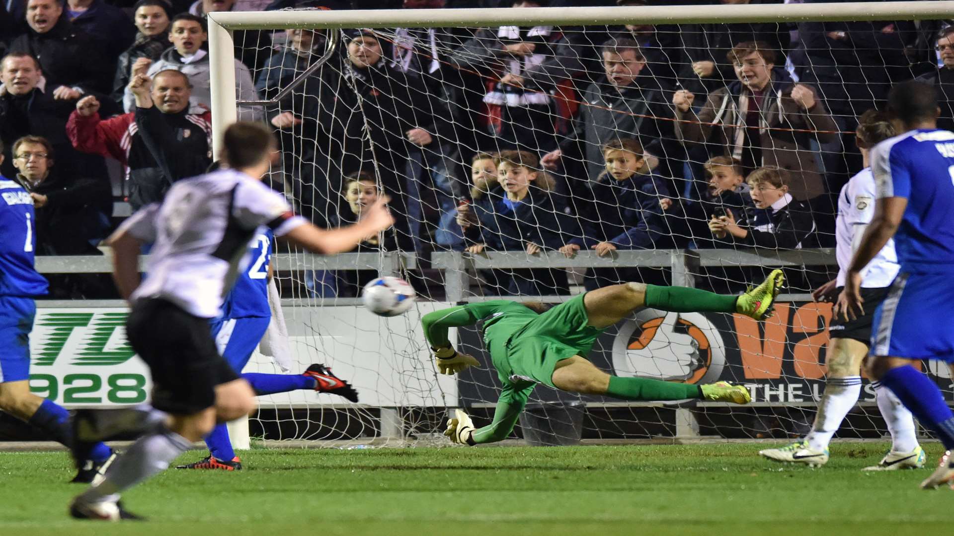 Jonathan Henly's dive is in vain as Max Cornhill puts Dartford 1-0 up Picture: Keith Gillard