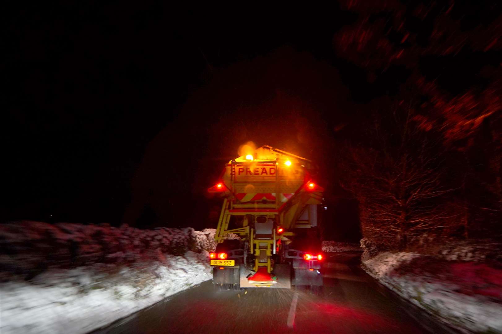 A gritter salts a road in the centre of Buxton, Derbyshire (Peter Byrne/PA)