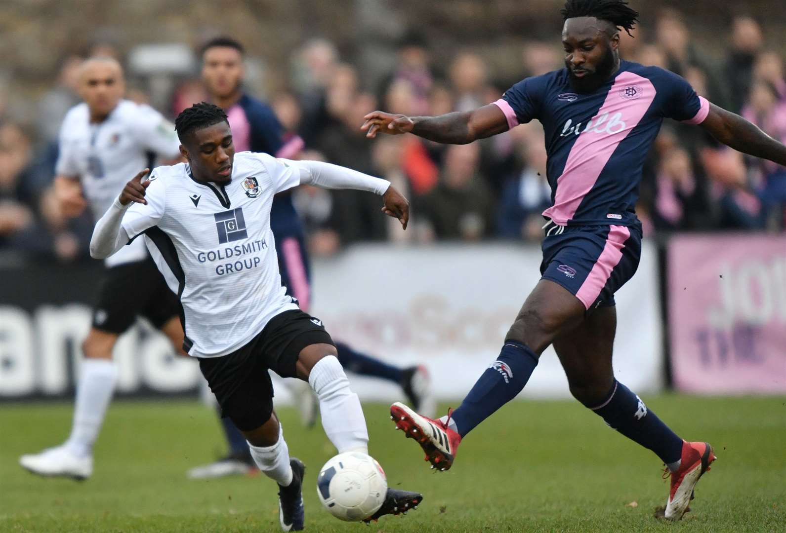 Darren McQueen gets to the ball first for Dartford on Saturday. Picture: Keith Gillard