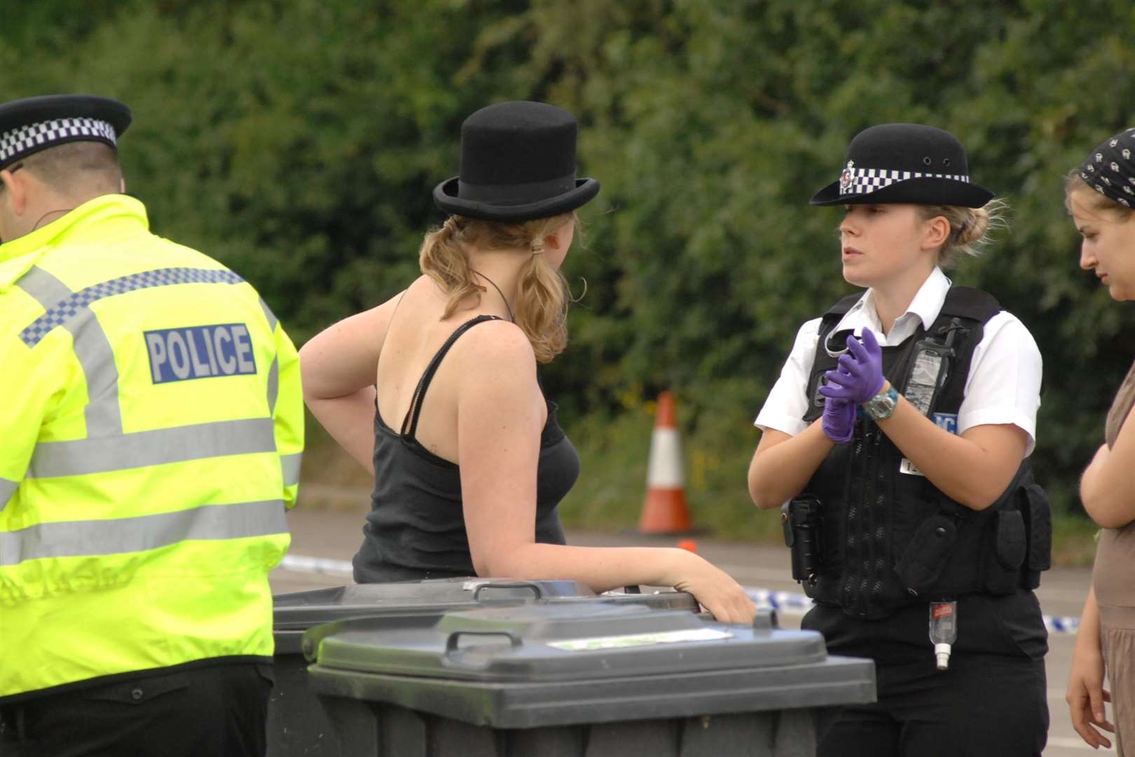 Protesters speak to offciers at the camp