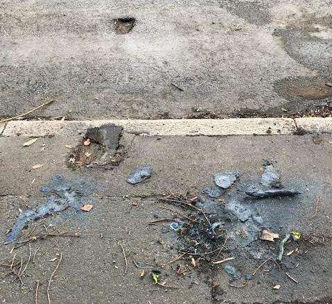 Damage to the pavement in London Road, Stone, left behind by the trailer