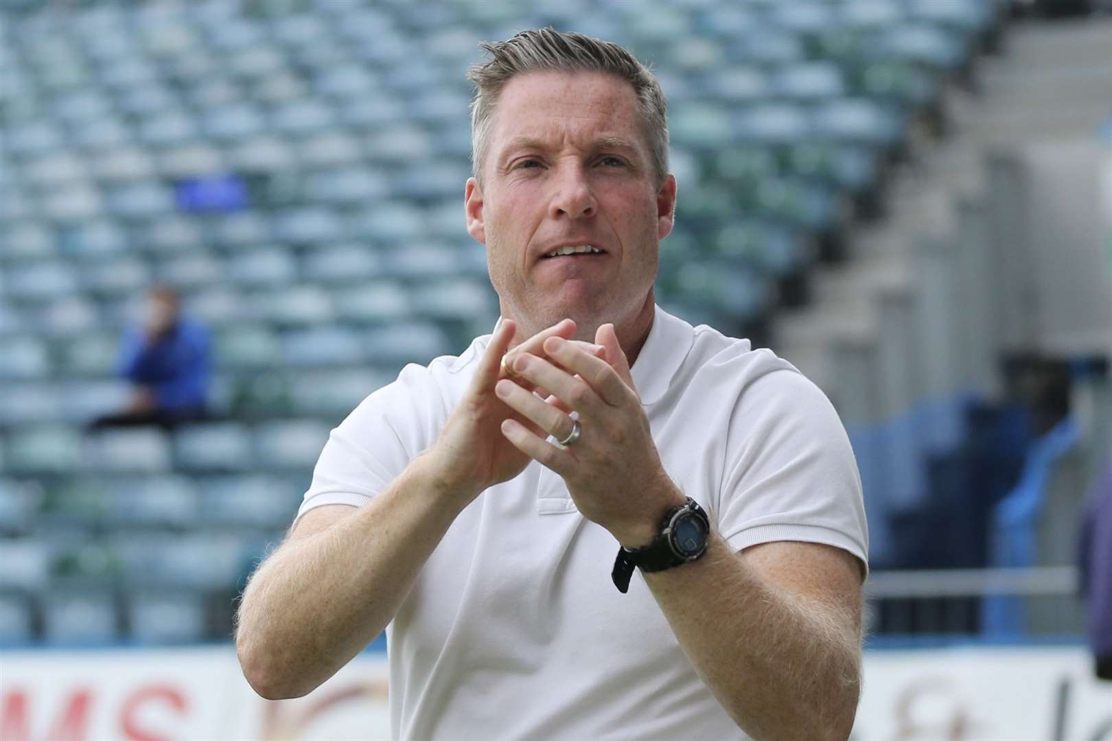 Gillingham boss Neil Harris applauds the fans during the match against Walsall. Picture: KPI