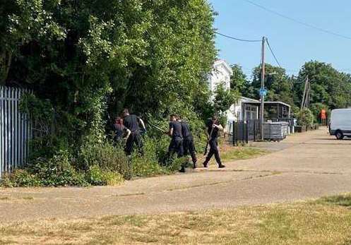 Police searching for the murder weapon at the chalet park