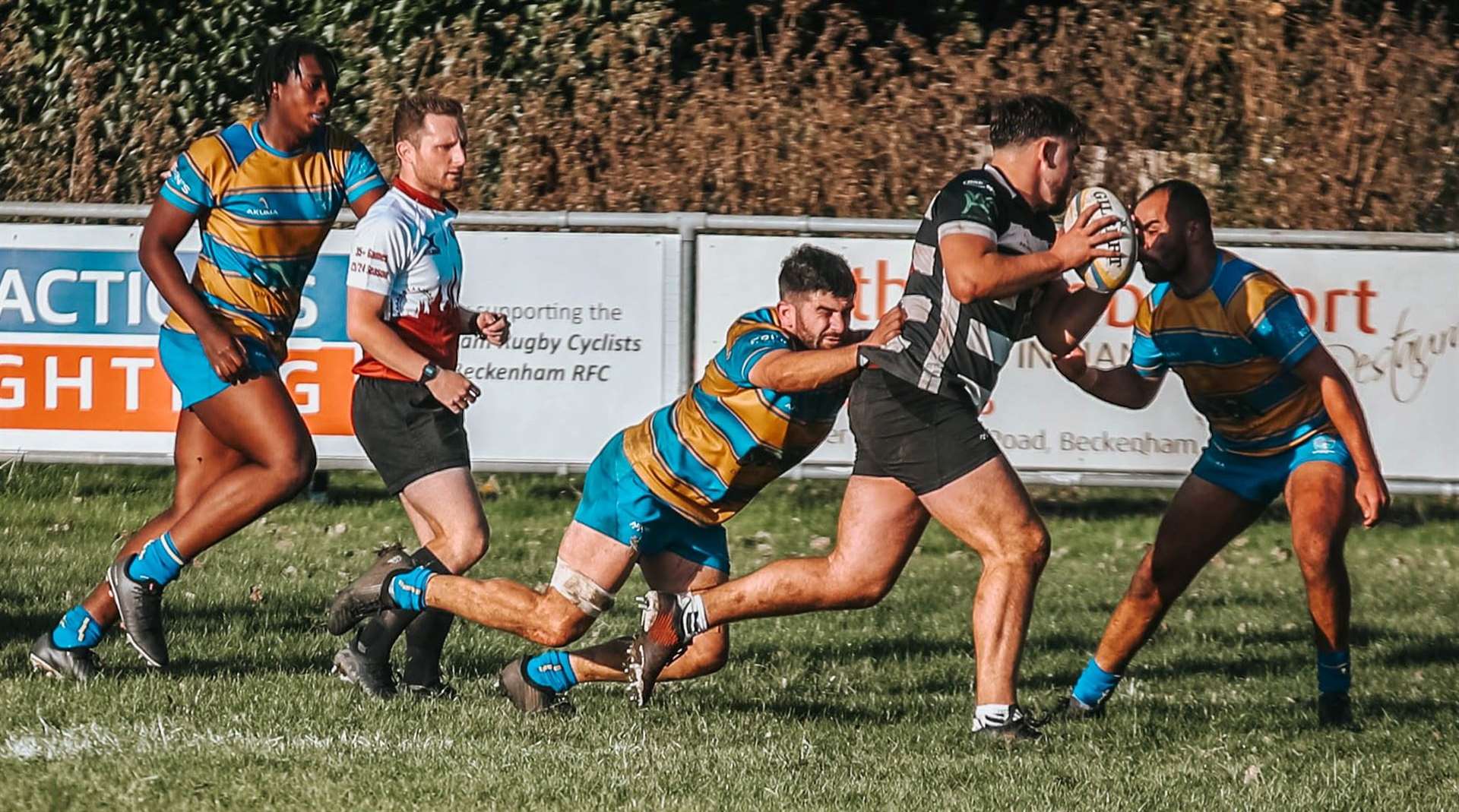 Gravesend's Will Stener takes on two Beckenham opponents. Picture: JP_Photographeruk