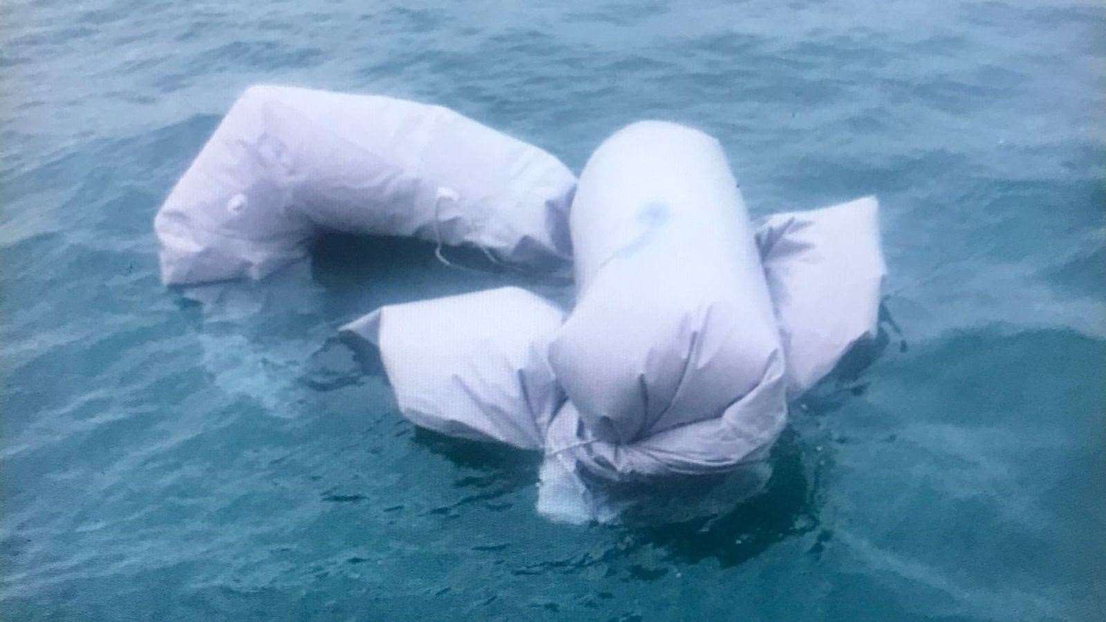 The sunk dinghy off Calais. Picture: Local lifeboat crew