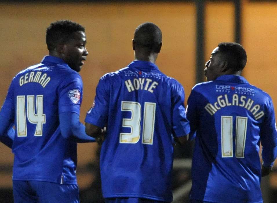 Antonio German (left) and Jermaine McGlashan (right) debate who got the equaliser. Picture: Barry Goodwin