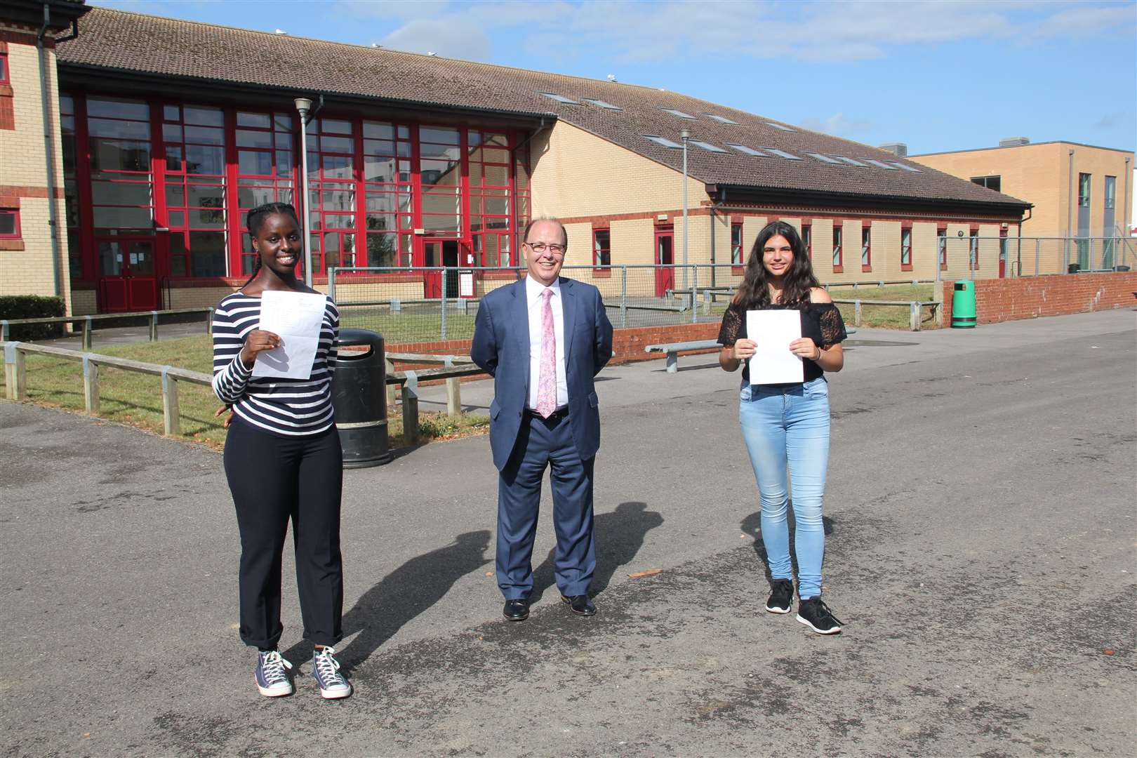 High scorers Janiece-Adu Nsiah and Sophie Douglas with John Wallis head teacher John McParland