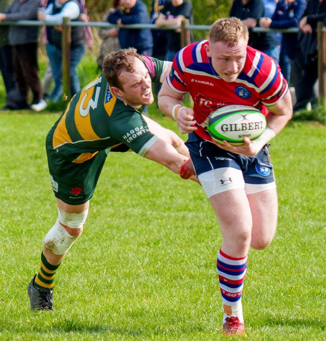 Tonbridge Juddians' Luke Talbot evades a challenge to score against Barnes. Picture: Karl Lincoln