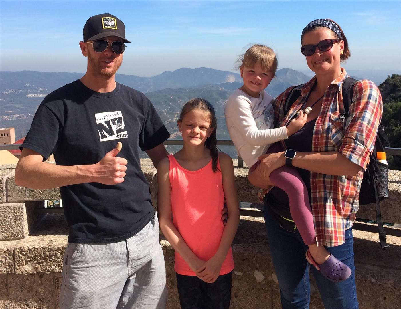 Former Meredale teacher Tom with Emily, Lizzie and Bianca