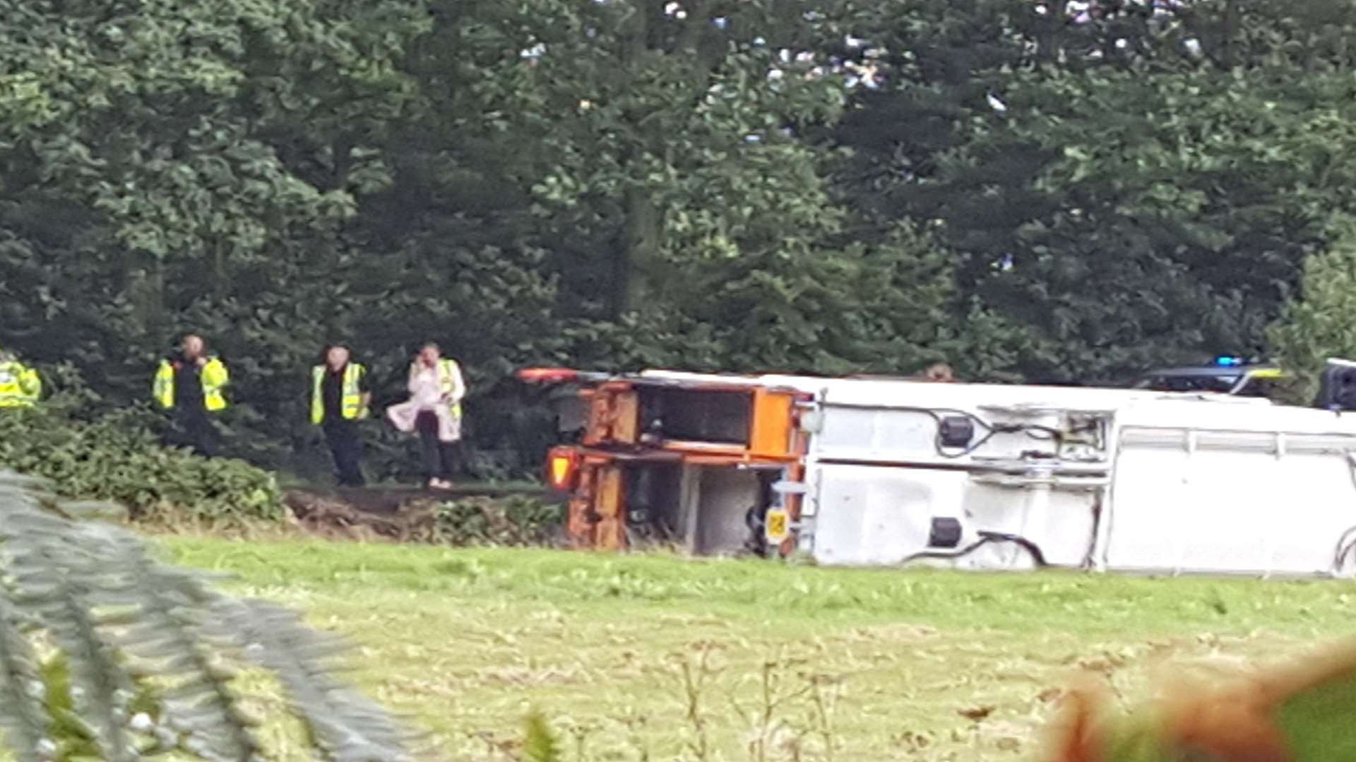 The bin lorry on its side