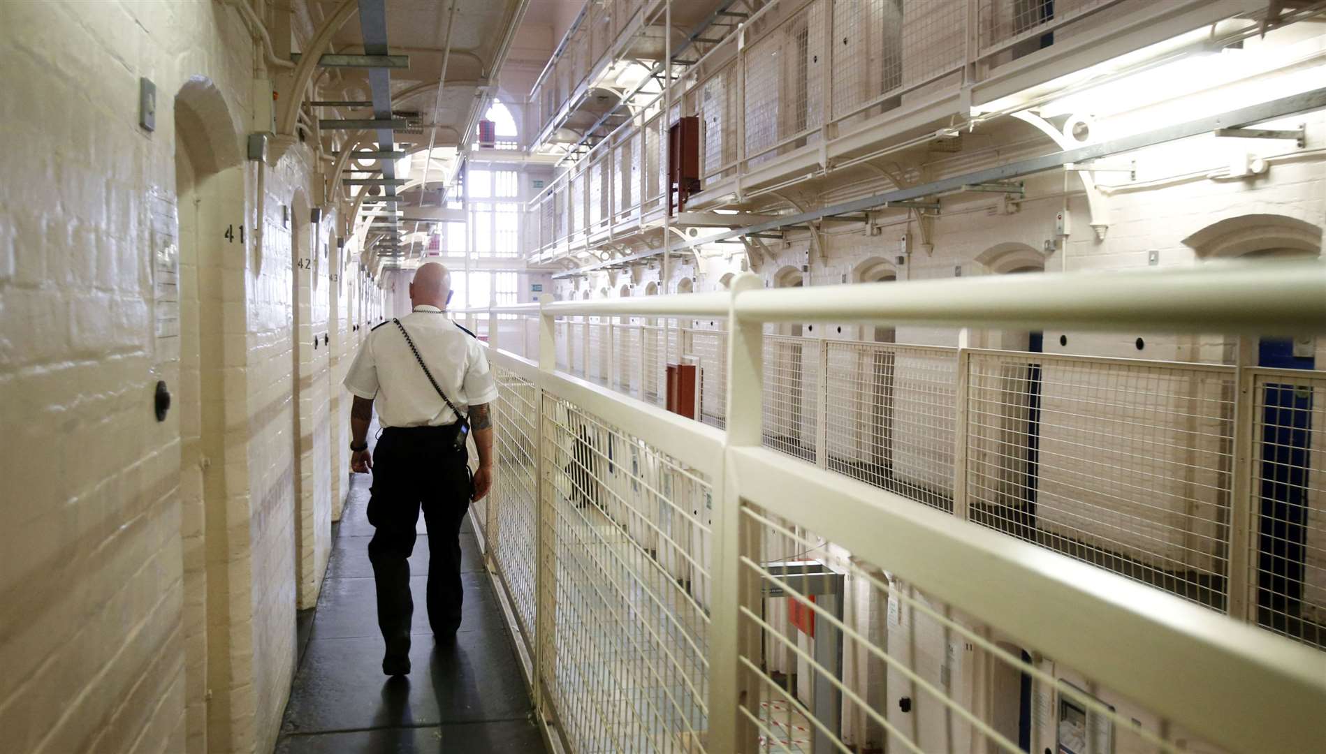 A prison officer on a landing (Danny Lawson/PA)