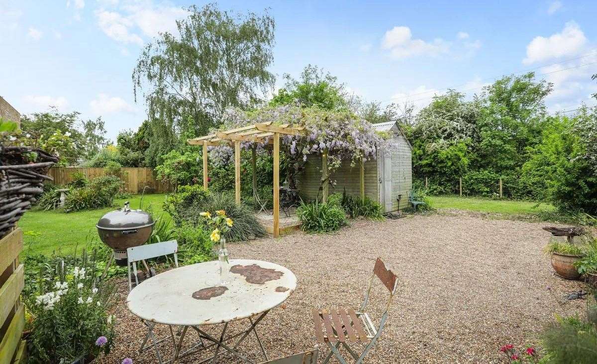 The property boasts a large garden with three outbuildings and a separate annexe. Picture: Miles and Barr