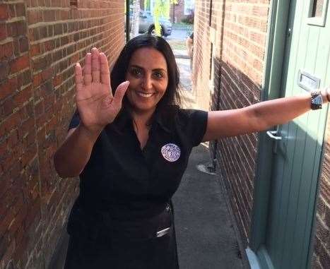 She might be smiling, but barmaid Tapi is keen for as many folk as possible to enjoy the Malling Jug