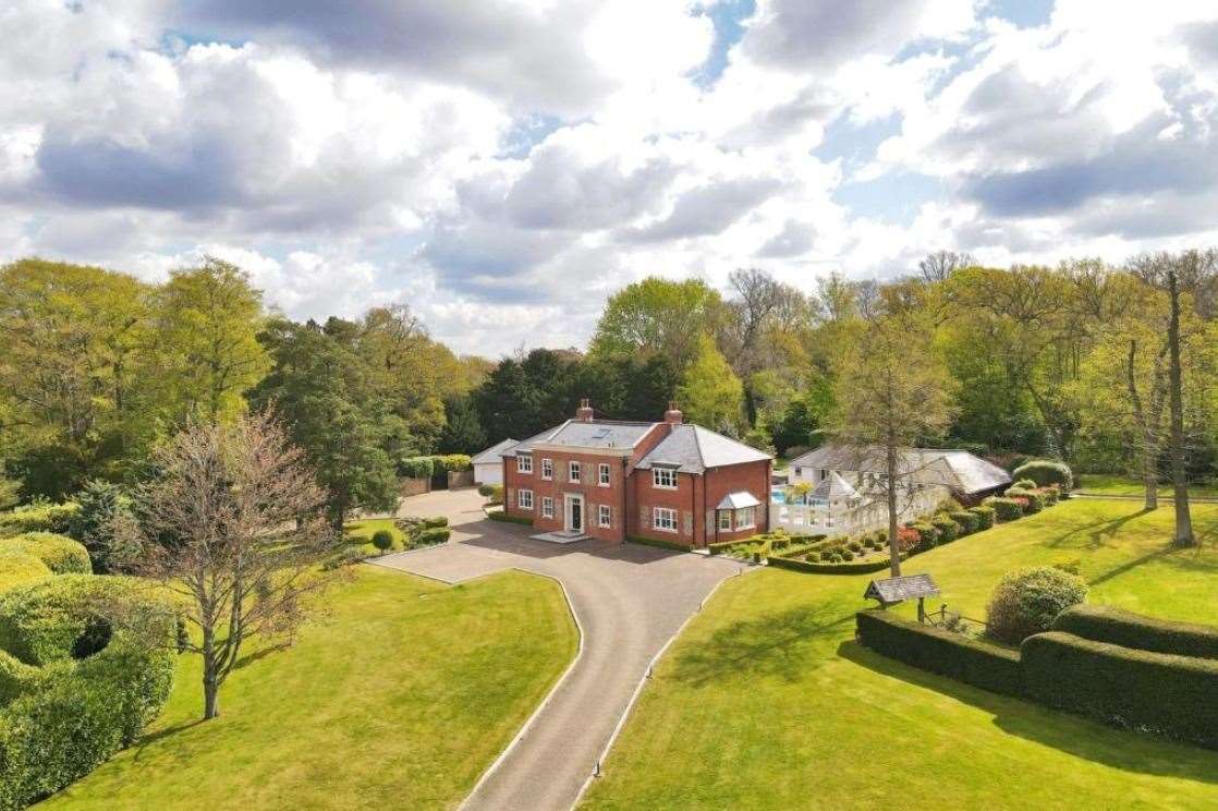 Fawkham Manor Farm has a Miami feel with its poolside palm trees Picture: Savills