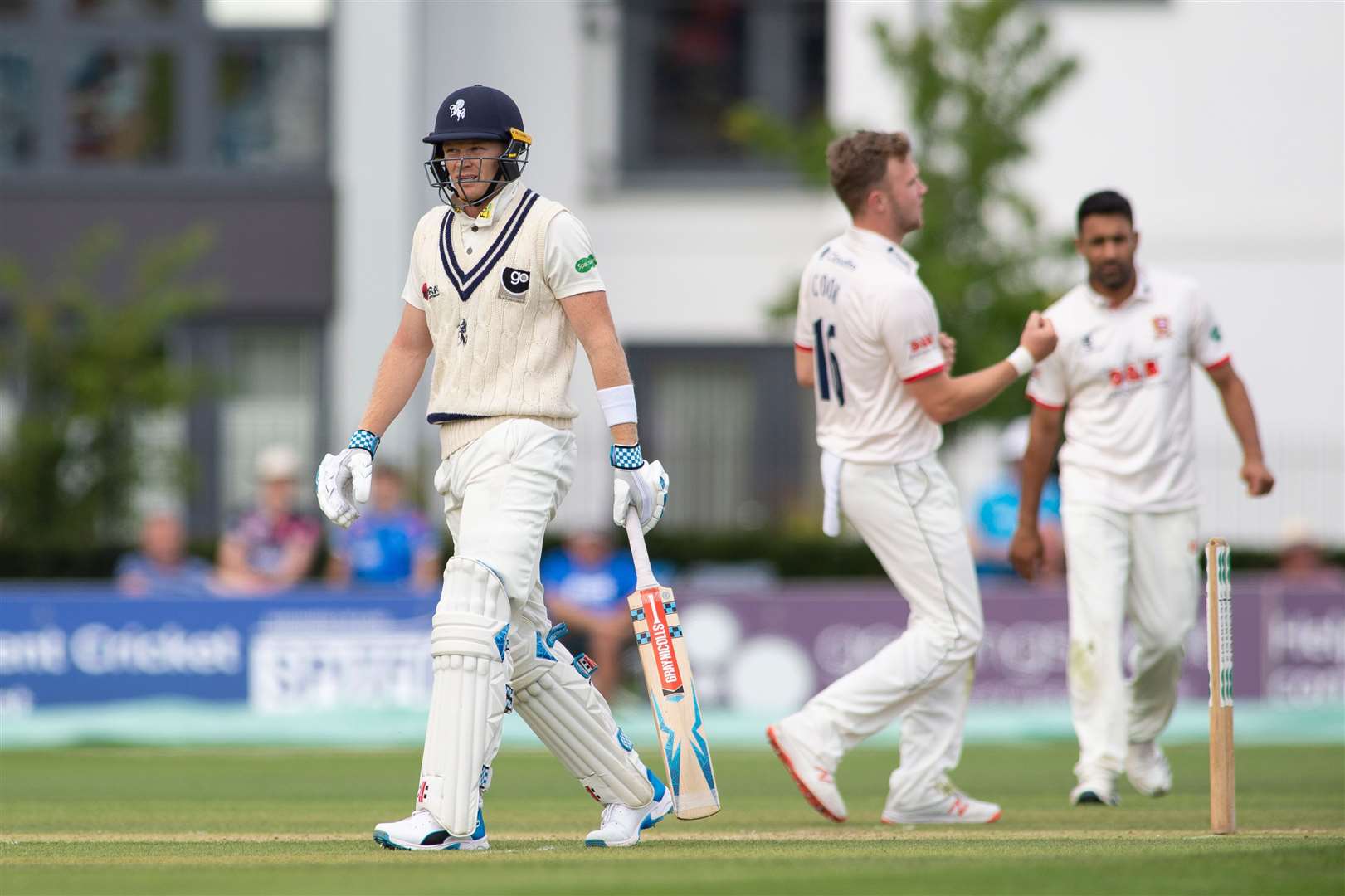 Kent's Sam Billings walks off after being beaten LBW to by Essex's Sam Cook. Picture: Ady Kerry