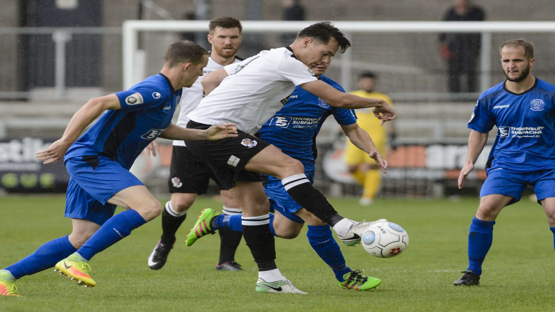 Alfie Pavey battles for possession against Chippenham Picture: Andy Payton