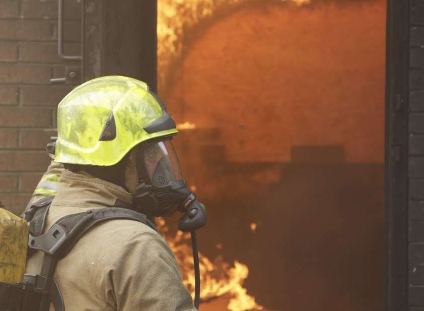 Firefighters wearing breathing apparatus tackled the blaze. Stock picture