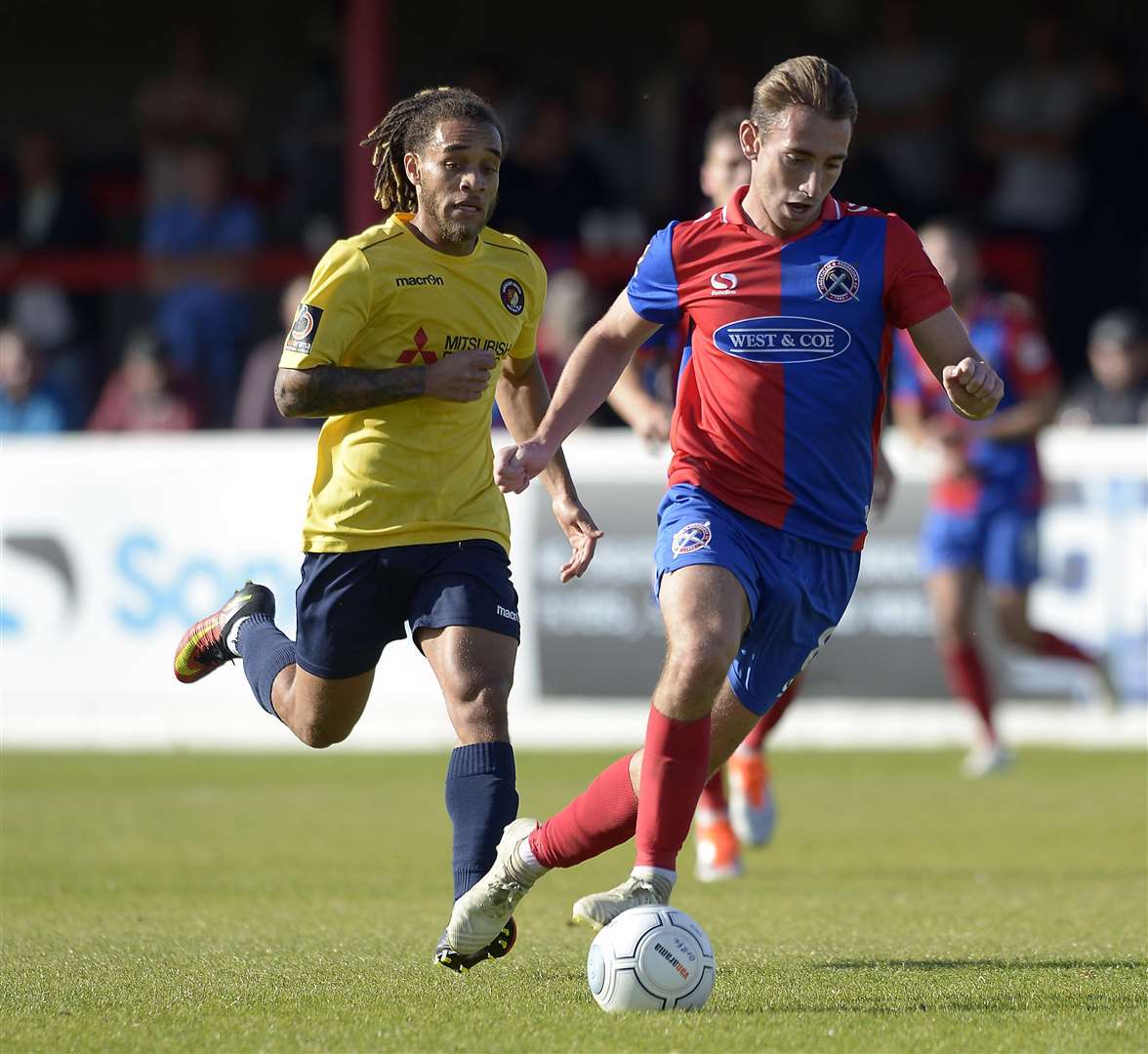 Reise Allassani tracks Harry Donovan during Ebbsfleet's win at Dagenham Picture: Jimmy Griffiths