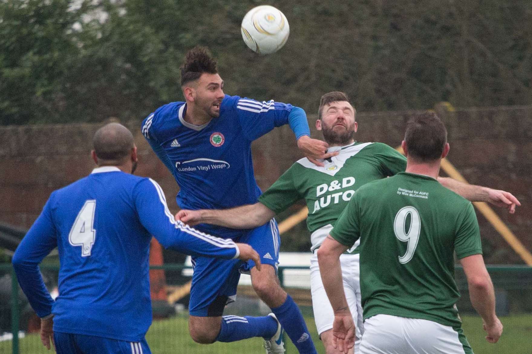 Ashford, green, taking on Beckenham the Southern Counties East League. The league is merging with the Kent Invicta League from next season Picture: Rebecca Holliday