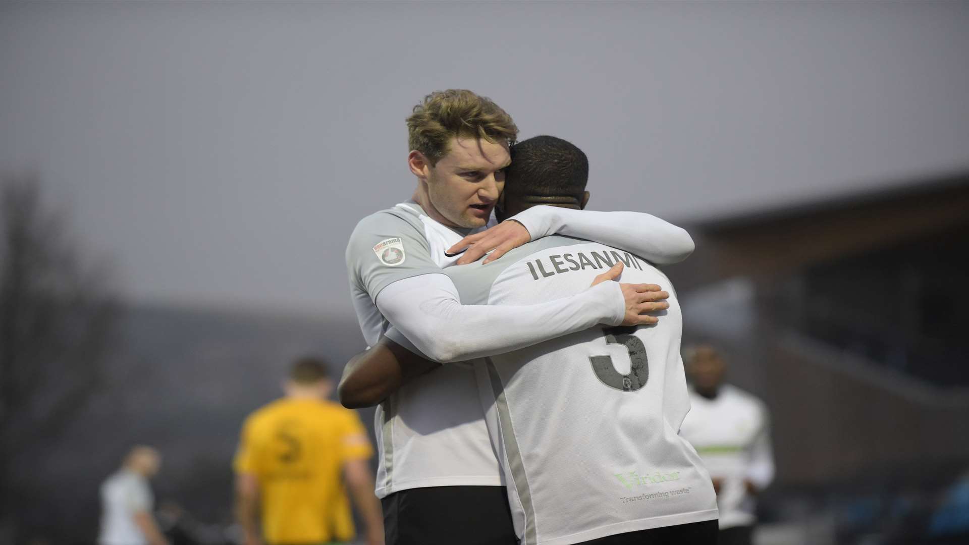 Ryan Bird celebrates with Femi Ilesanmi after scoring Dover's second against Marine. Picture: Tony Flashman