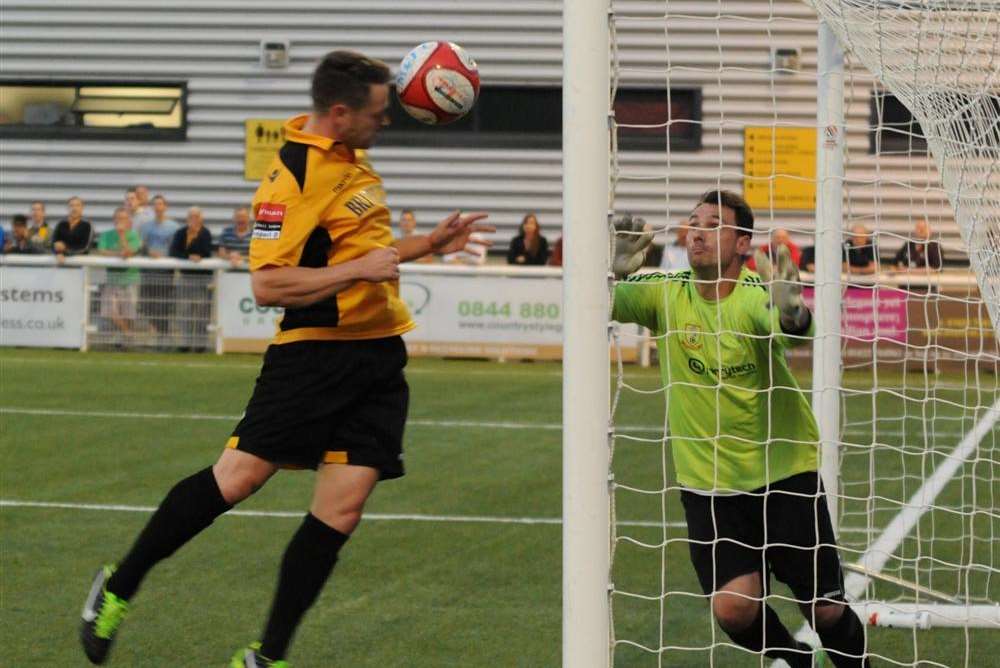 Frannie Collin heads the winner past Michal Czanner (Picture: Steve Terrell)