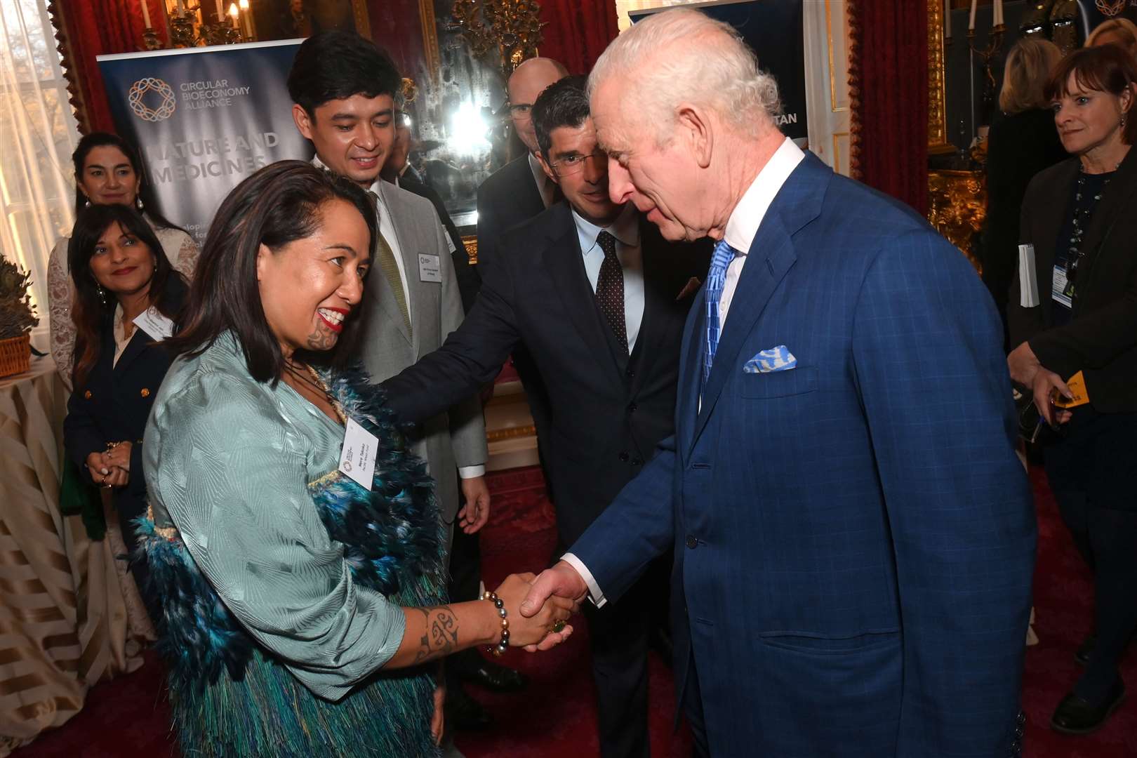 The King shakes hands with Mere Takoko at the launch of the Circular Bioeconomy Alliance at St James’s Palace in London (Eamonn McCormack/PA)