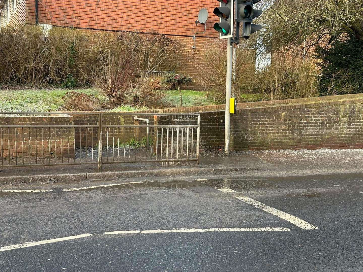 A water leak in Main Road, Sutton-at-Hone, just a few yards from the library