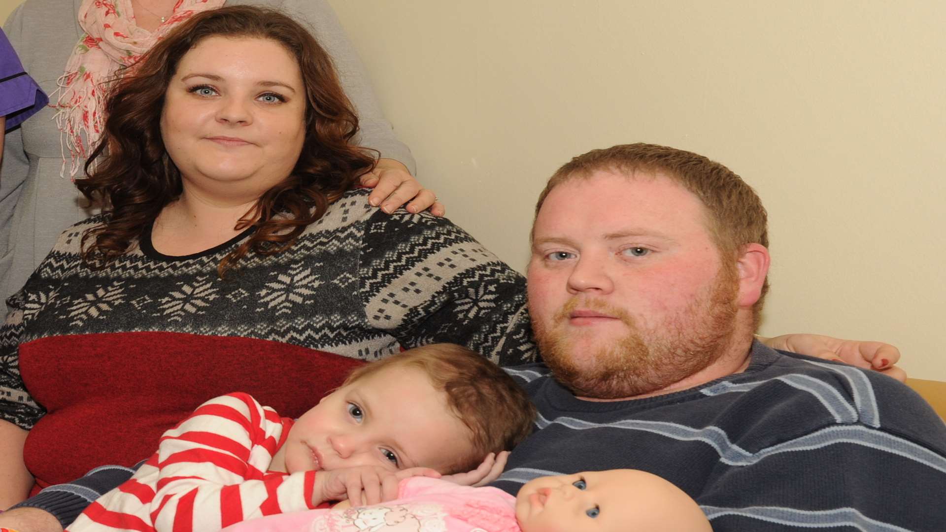 Ruby with her parents Vikki and Rob Young.