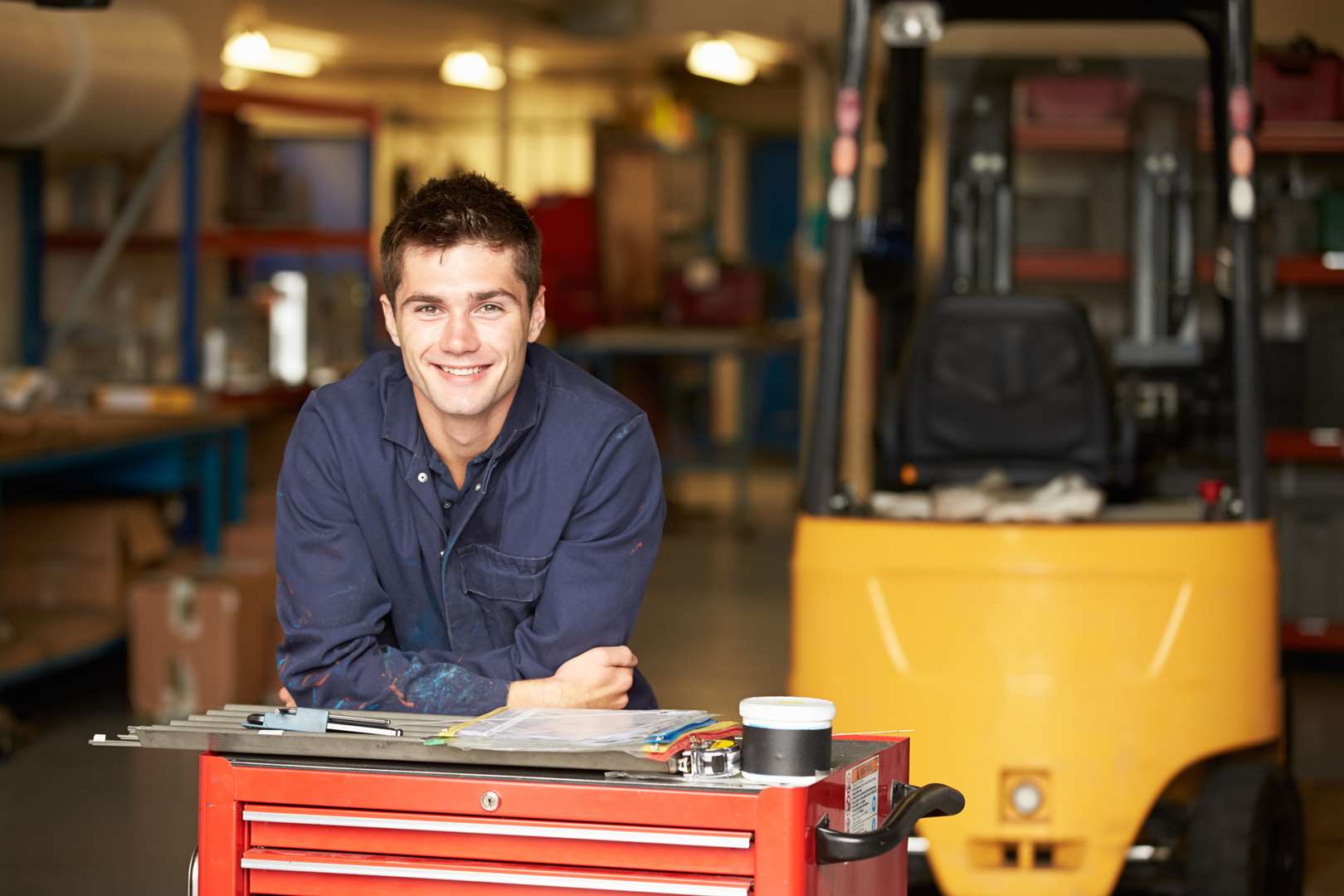 An engineering apprentice in a factory