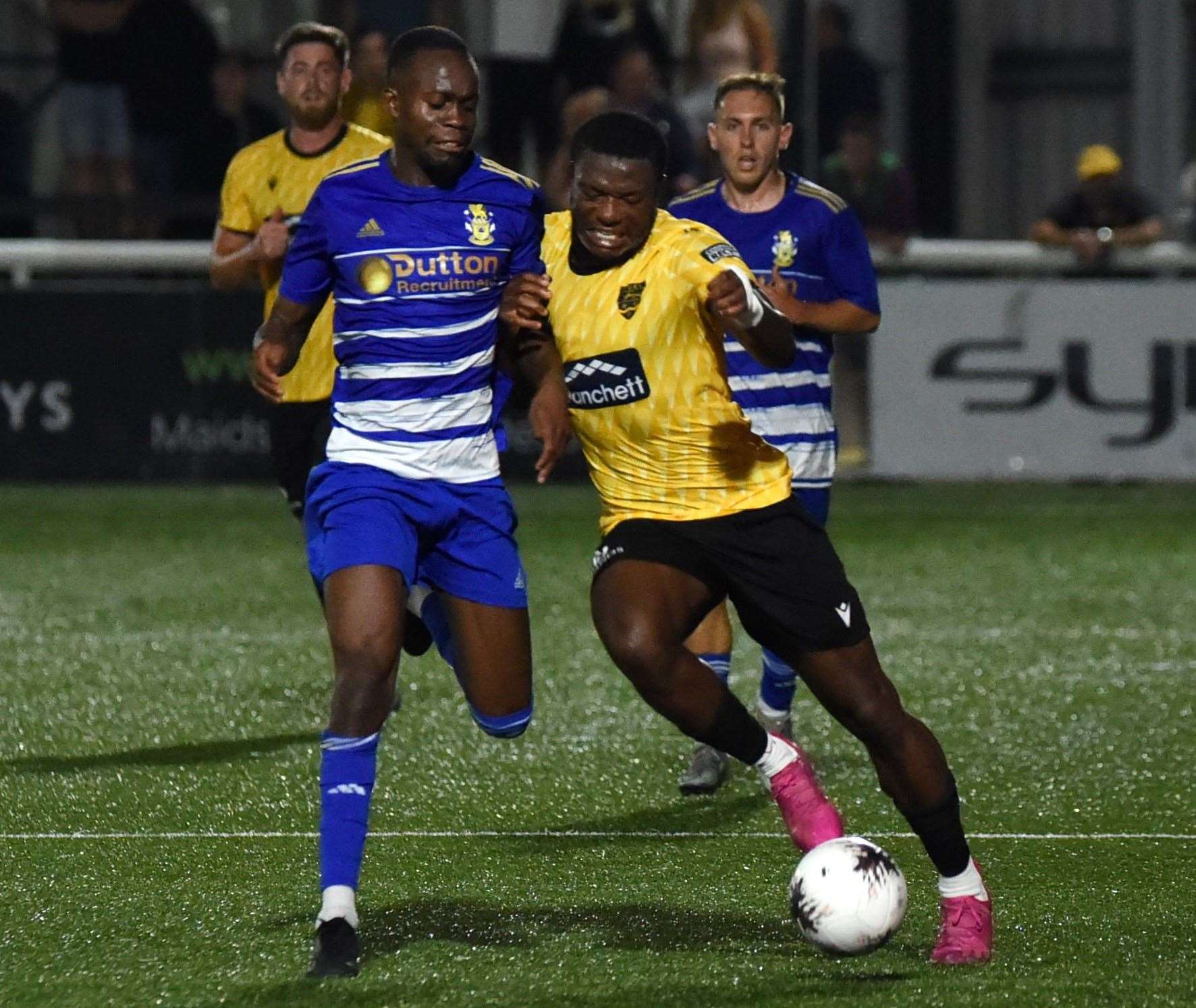 Chi Ezennolim battles for possession against Aveley on Tuesday night. Picture: Steve Terrell