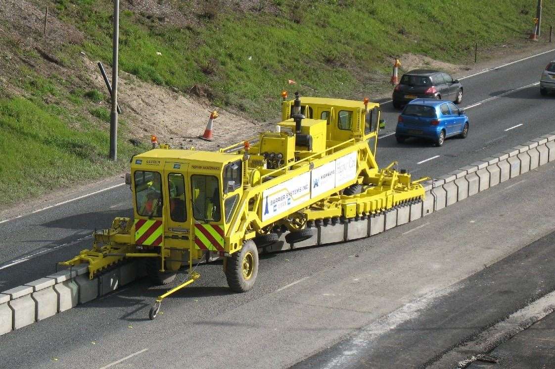 A 'zipper' machine will install and remove the concrete blocks