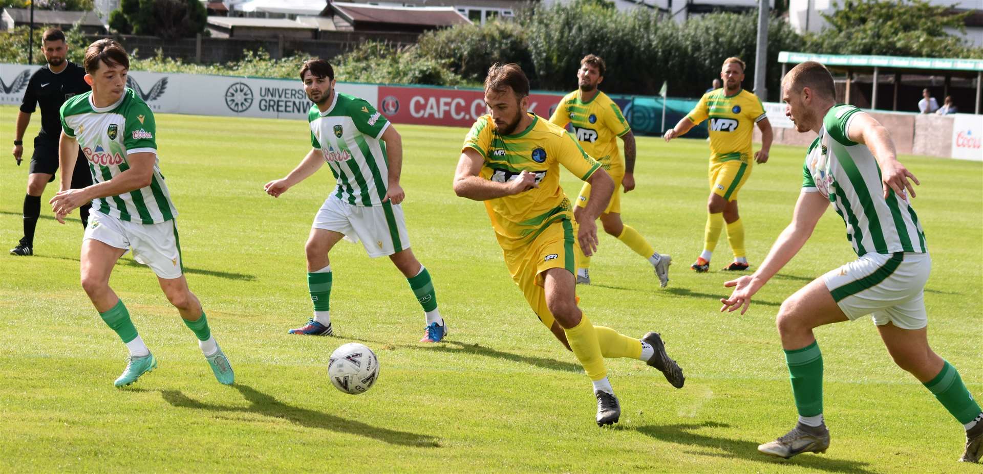 Lydd's Luke Burdon takes on the VCD defence. Picture: Alan Coomes