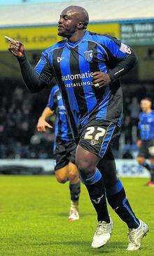 Adebayo Akinfenwa celebrates his winner against Stevenage