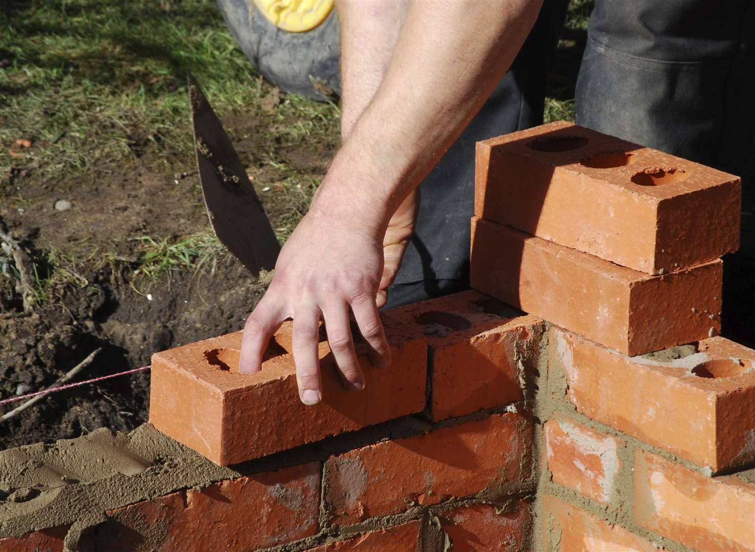 KMG GROUP USE ONLYConditions of Use: MUST CREDIT: iStock.comSlug: bricklayer KE 231215Caption: A bricklayer at workLocation: AshfordCategory: Human InterestByline: UnknownContact Name: iStock.com Contact Email: Contact Phone: 0203 227 2713Uploaded By: Alastair IRVINECopyright: UnknownOriginal Caption:Construction worker laying bricks wall of building FM4160222 (3554682)