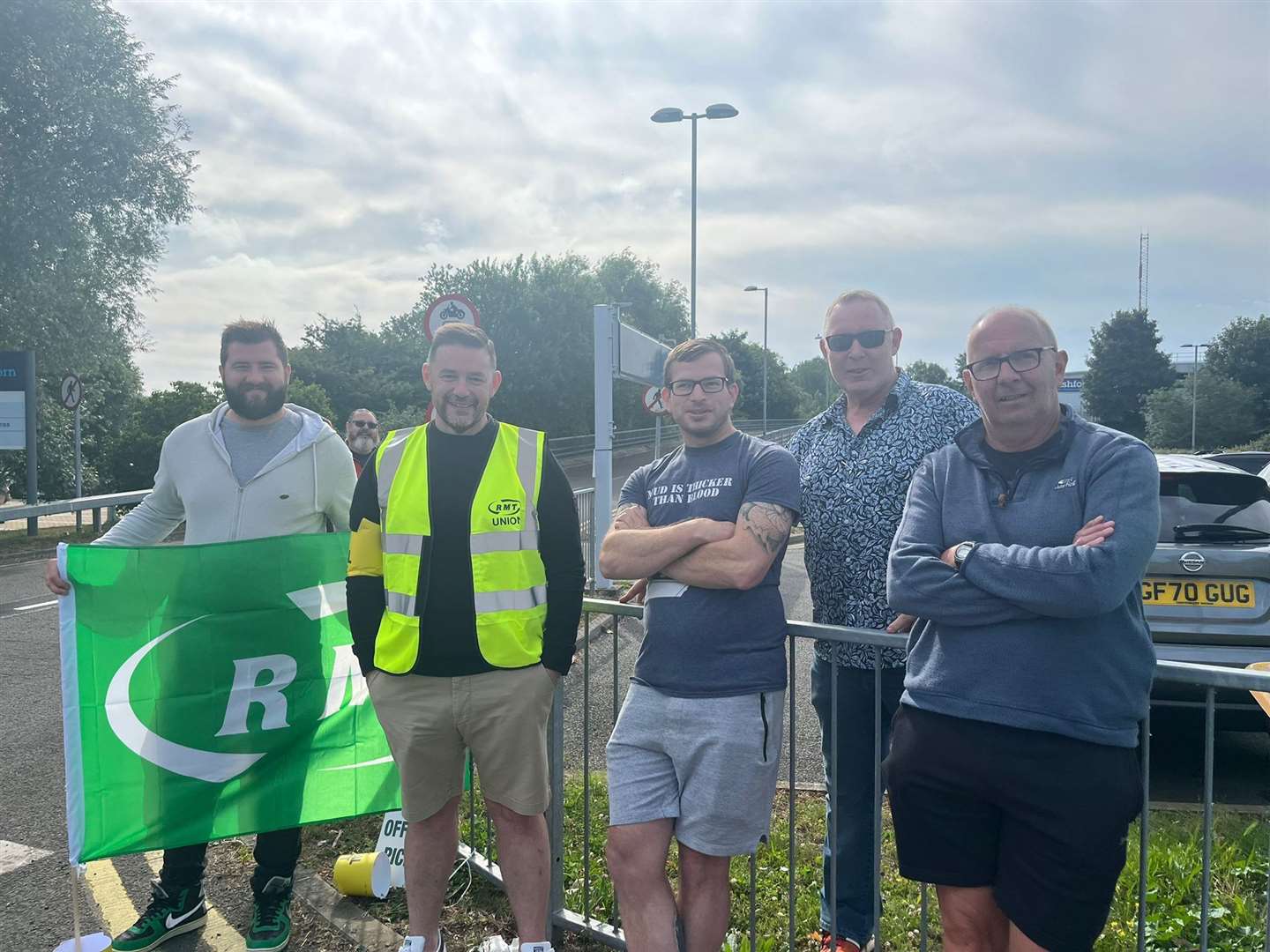 Mmebers of the RMT union outside Ashford International Nick (in high-vis) and Martin (to his left)