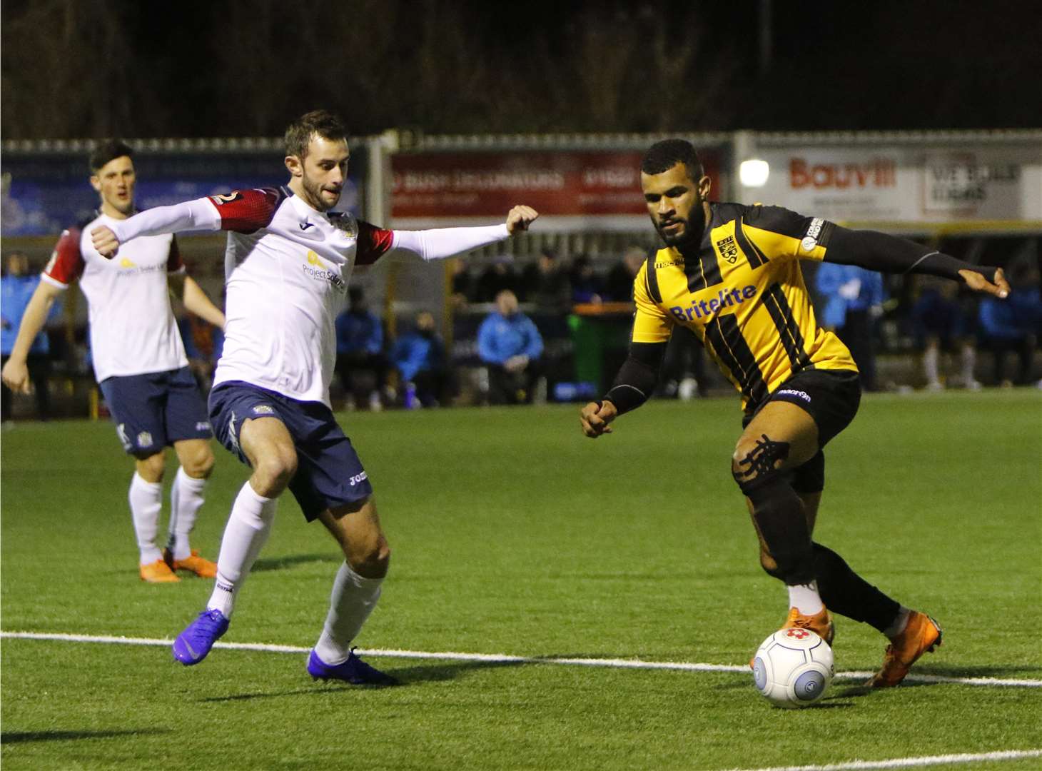 Dan Wishart gets at the Stockport defence Picture: Andy Jones