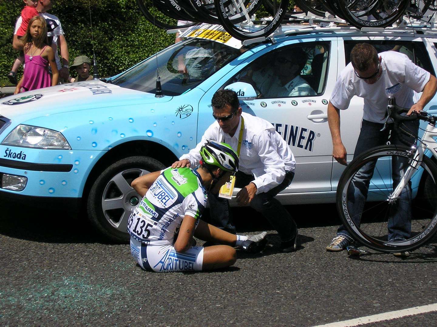 A fallen rider assessed after colliding with a support car in Royal Engineers Road, Maidstone. Pic: Lena Ward