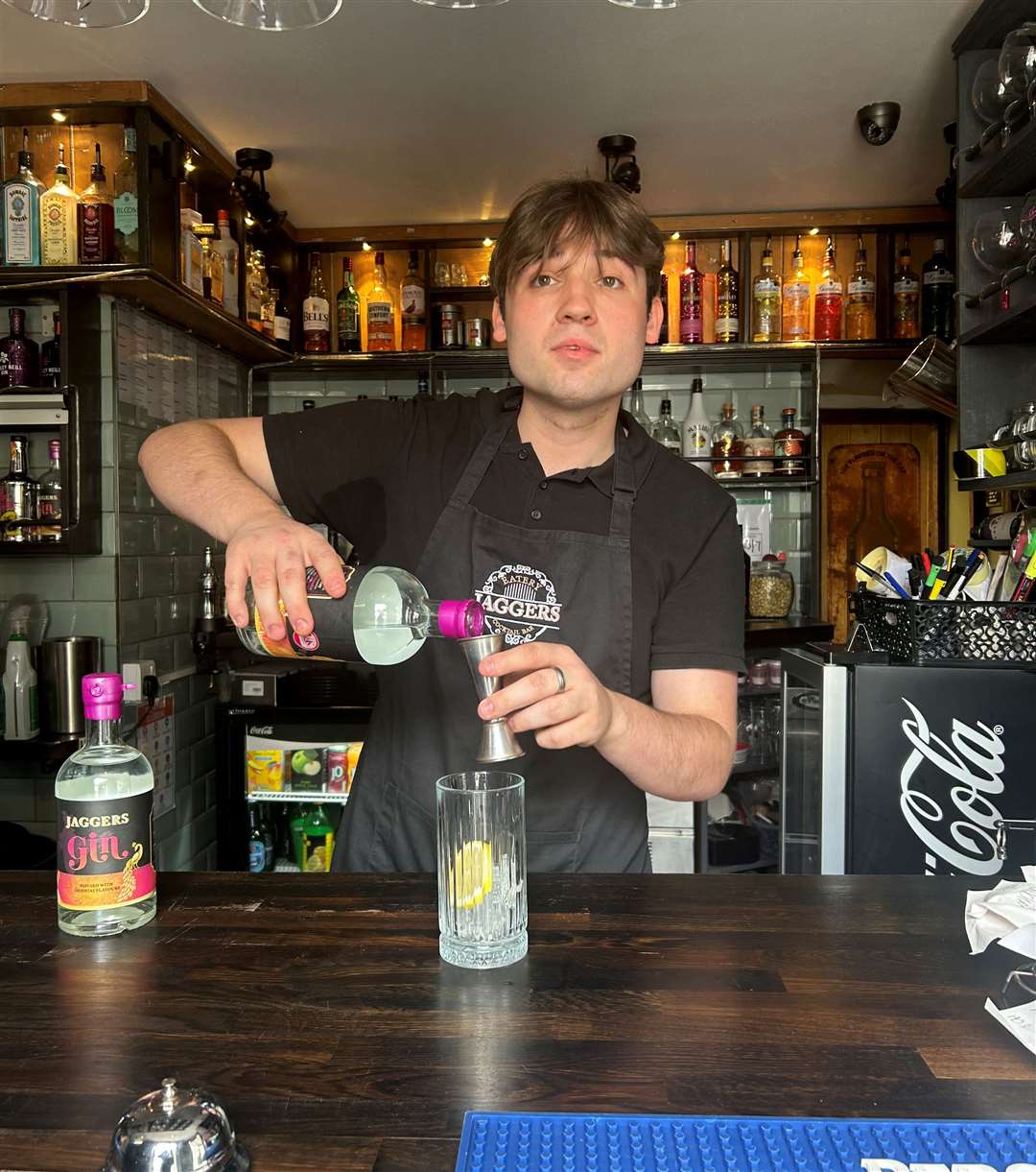 Bar tender Jorens Hearn serves Jaggers Gin