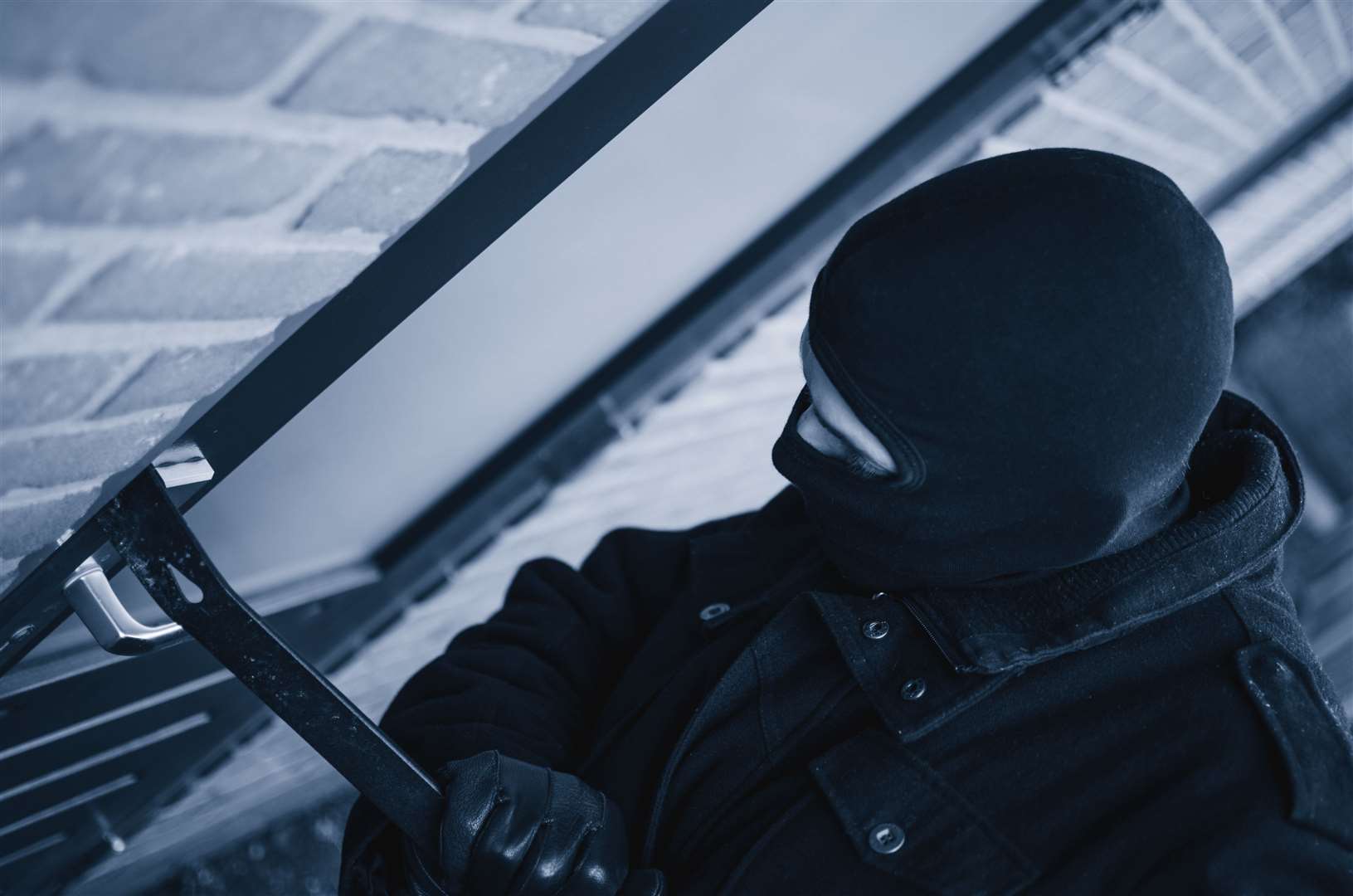 The men were wearing balaclavas. Stock Image