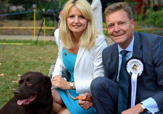 South Thanet MP Craig Mackinlay with his wife Kati Mackinlay and their chocolate labrador, Libby. Picture: Craig Mackinlay