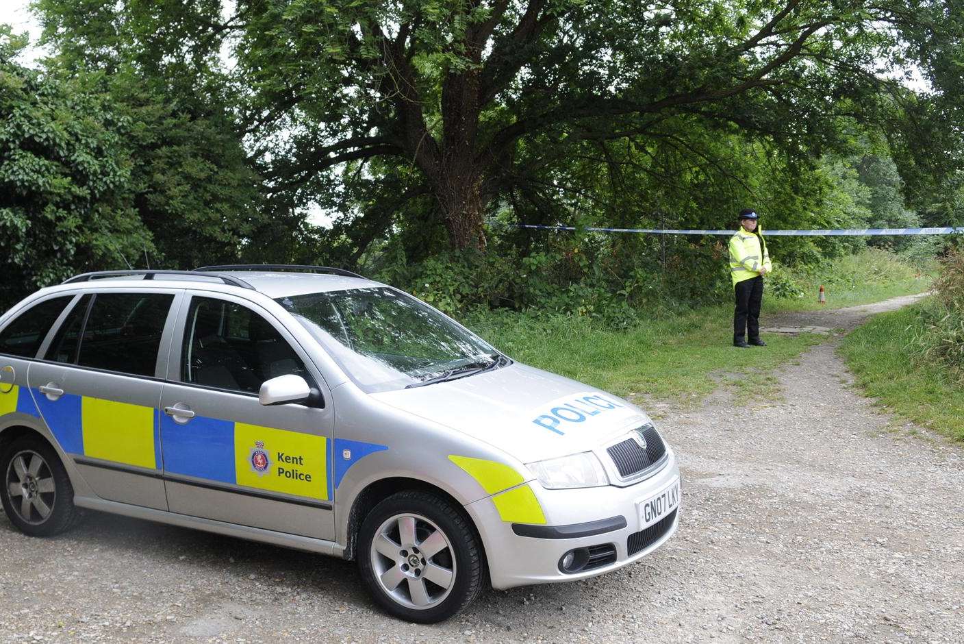 Police at the canal path where Hatcher was arrested