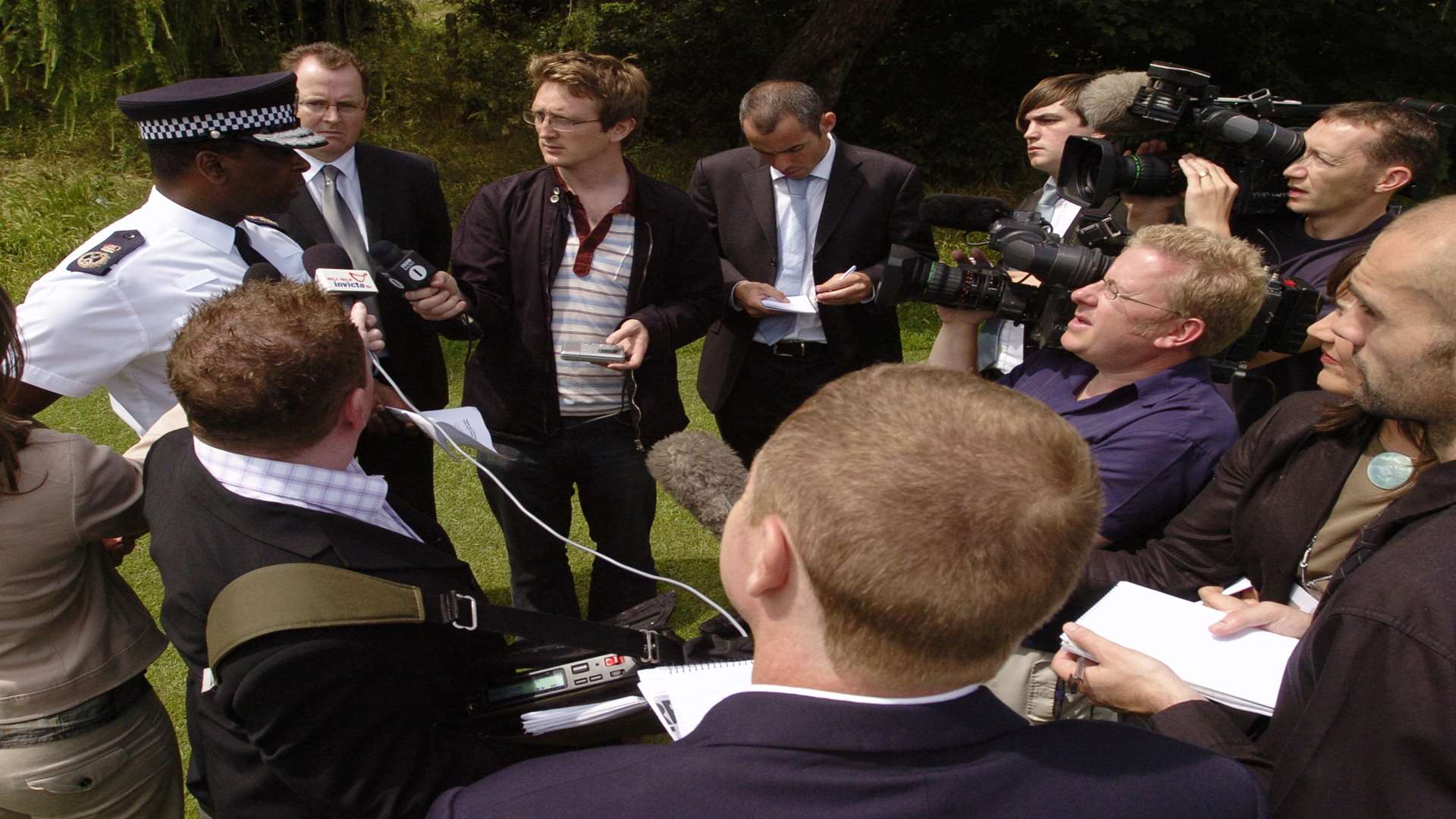 Media surround then-Chief Constable Mike Fuller at the murder scene. Picture by Andy Payton